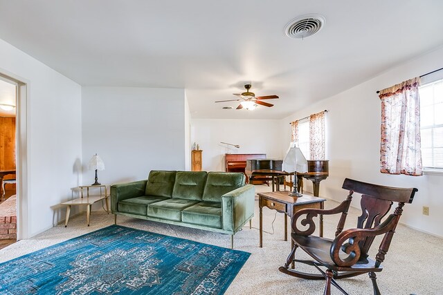 2645 A & M Ave, San Angelo, TX 76904 - carpeted living room with ceiling fan and baseboards