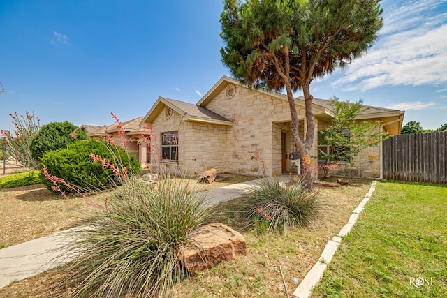 4641 Southland Blvd, San Angelo, TX 76904 - ranch-style home featuring stone siding