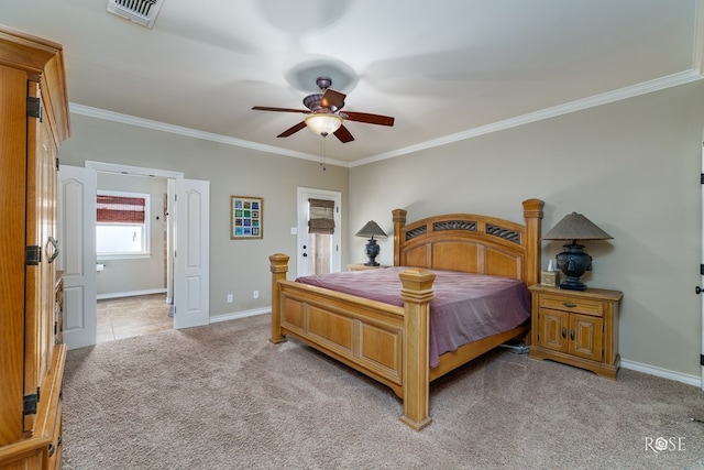 4641 Southland Blvd, San Angelo, TX 76904 - bedroom with light carpet, crown molding, baseboards, and ceiling fan
