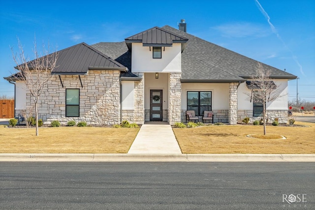 view of front of home with a front yard