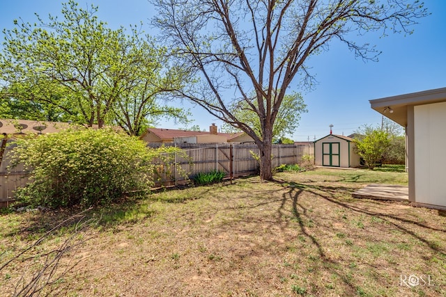 3853 Sandstone Rd, San Angelo, TX 76904 - fenced backyard featuring a storage unit