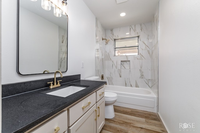 3853 Sandstone Rd, San Angelo, TX 76904 - full bathroom featuring vanity, tub / shower combination, and wood finished floors