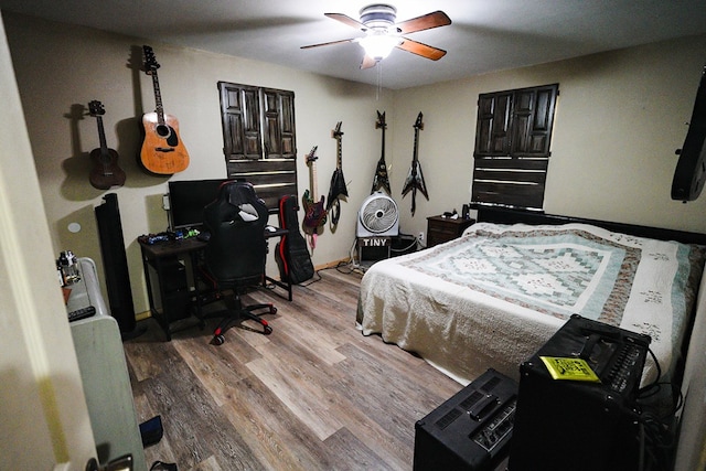 7229 Sun Ln, San Angelo, TX 76901 - bedroom featuring wood finished floors and ceiling fan