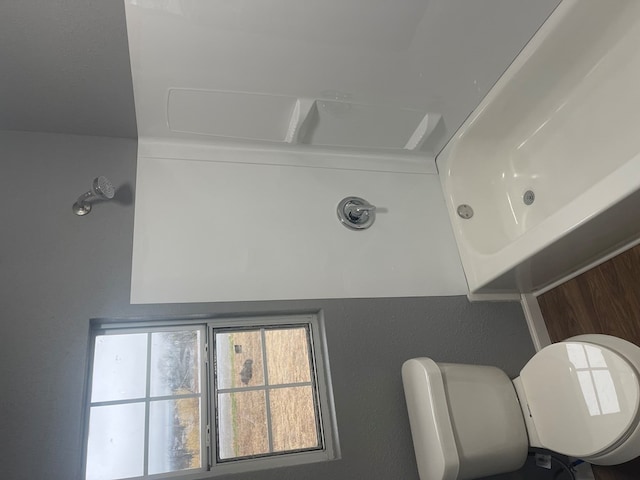 bathroom featuring toilet