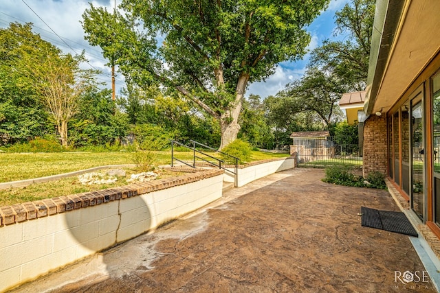 view of yard with a patio area