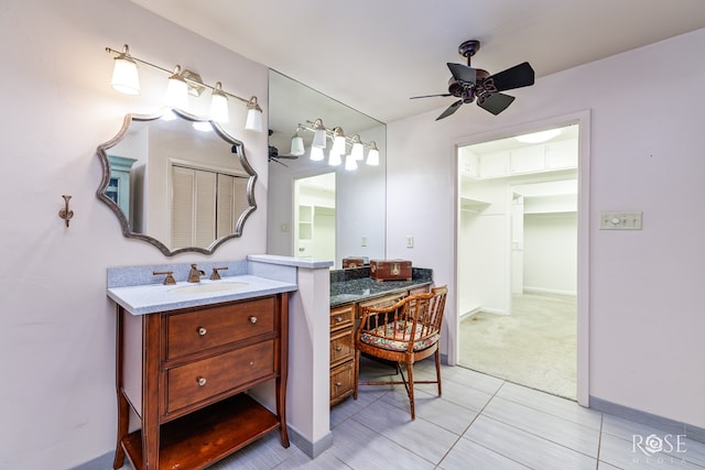 bathroom featuring ceiling fan, vanity, and tile patterned flooring