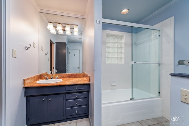 bathroom with enclosed tub / shower combo, vanity, tile patterned flooring, and ornamental molding