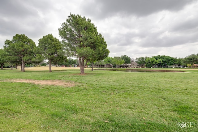 2105 Valleyview Dr, San Angelo, TX 76904 - view of grassy yard featuring a water view