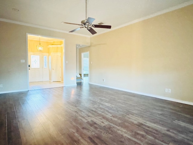 spare room featuring ceiling fan, ornamental molding, and dark hardwood / wood-style flooring