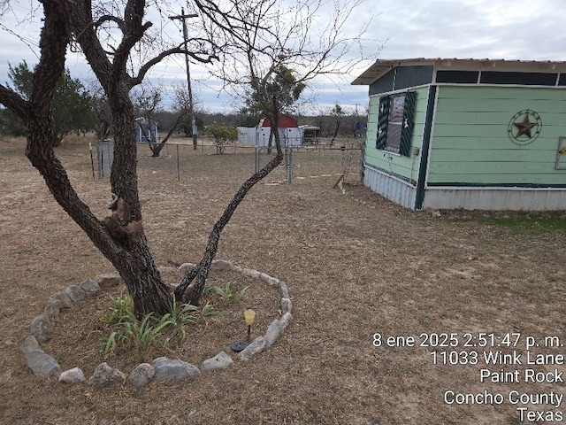 view of yard with fence