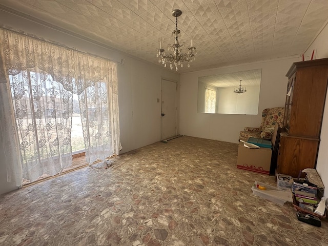 1009 E 6th St, Big Lake, TX 76932 - unfurnished dining area with an ornate ceiling, an inviting chandelier, and ornamental molding