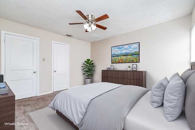 312 N Washington St, San Angelo, TX 76901 - bedroom with carpet flooring, a ceiling fan, and baseboards