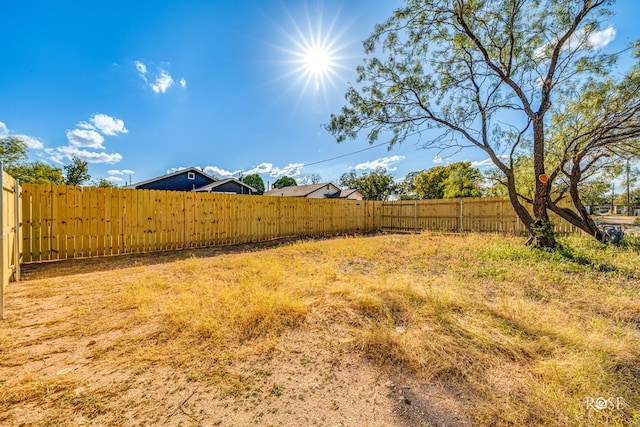 view of yard featuring a fenced backyard