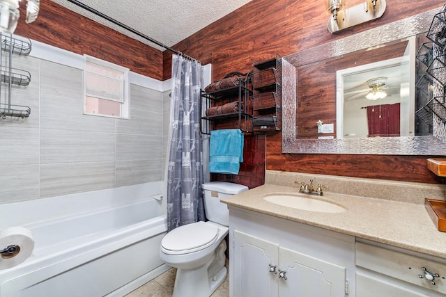 full bath featuring toilet, shower / tub combo, a textured ceiling, vanity, and tile patterned flooring