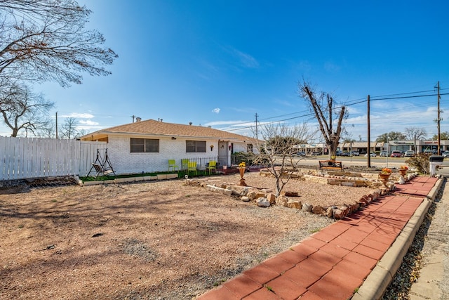 view of yard featuring fence