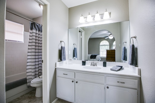 3306 Timber Ridge Dr, San Angelo, TX 76904 - full bathroom with vanity, shower / tub combo with curtain, ceiling fan, and tile patterned floors