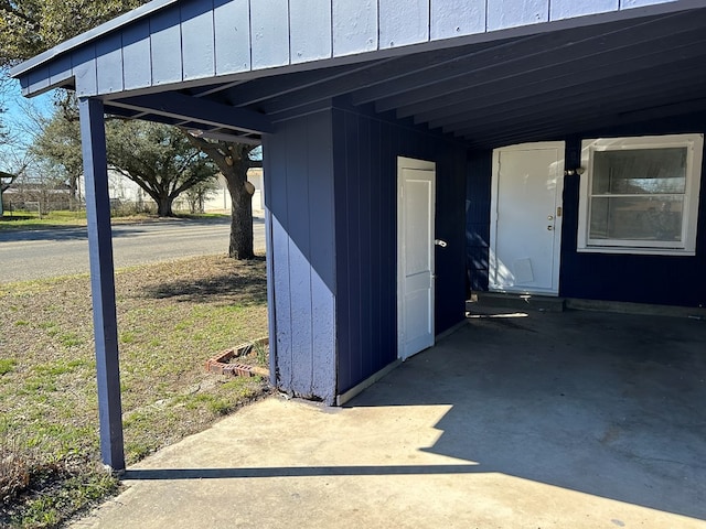 exterior space featuring a carport