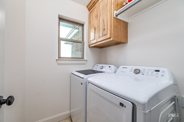 5292 Grey Wolf Ln, San Angelo, TX 76901 - laundry area with cabinet space and washer and dryer