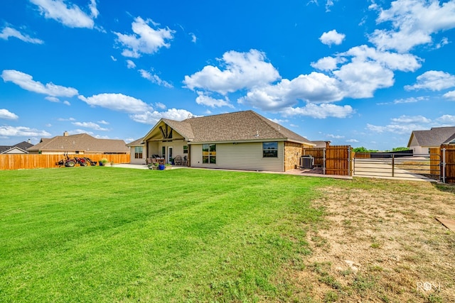 5292 Grey Wolf Ln, San Angelo, TX 76901 - back of property with cooling unit, a patio area, and a gate