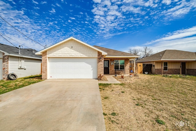 single story home with a garage, driveway, brick siding, and a front lawn