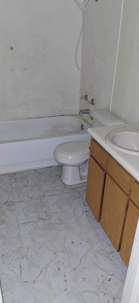 full bathroom with vanity, toilet, and bathing tub / shower combination