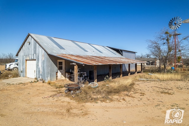 view of outbuilding with a garage