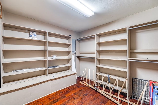 3237 Red Bluff Rd W, San Angelo, TX 76904 - spacious closet with dark wood-style floors