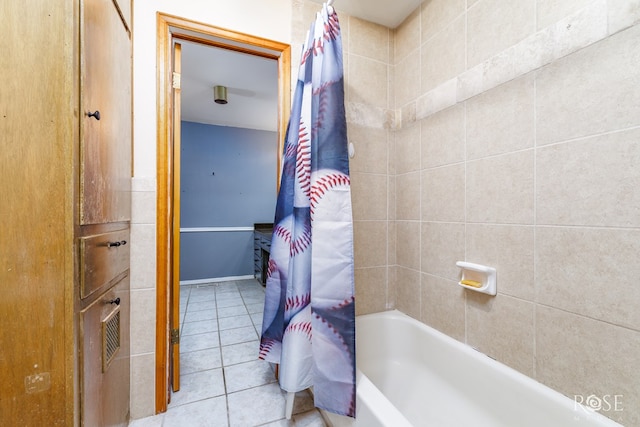 3237 Red Bluff Rd W, San Angelo, TX 76904 - full bathroom featuring tile patterned floors and shower / bath combo with shower curtain