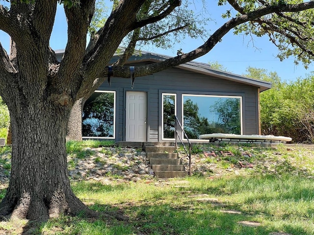 3237 Red Bluff Rd W, San Angelo, TX 76904 - view of side of home featuring entry steps