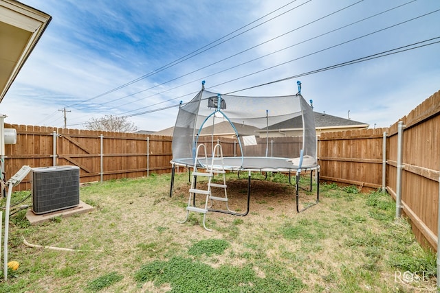 5221 Coral Way, San Angelo, TX 76904 - view of yard featuring a trampoline and cooling unit