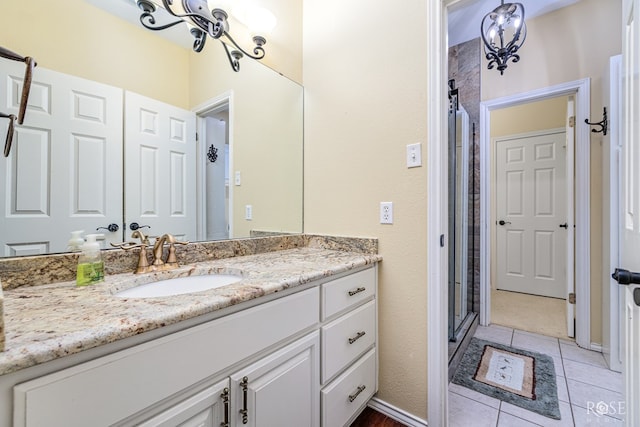 3122 Clearview Dr, San Angelo, TX 76904 - full bath with vanity, a stall shower, and tile patterned floors