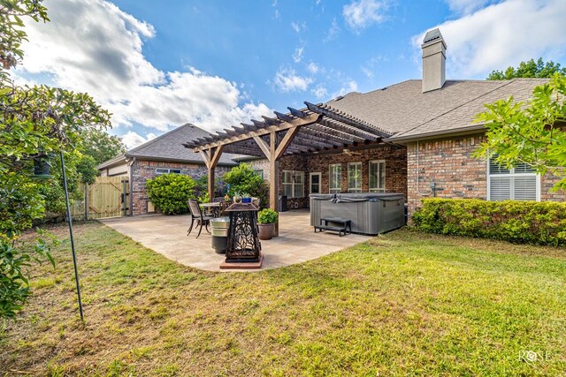 3122 Clearview Dr, San Angelo, TX 76904 - view of yard with a hot tub, a patio, a gate, and a pergola