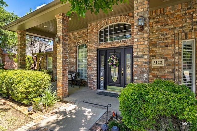 3122 Clearview Dr, San Angelo, TX 76904 - property entrance with brick siding and a porch
