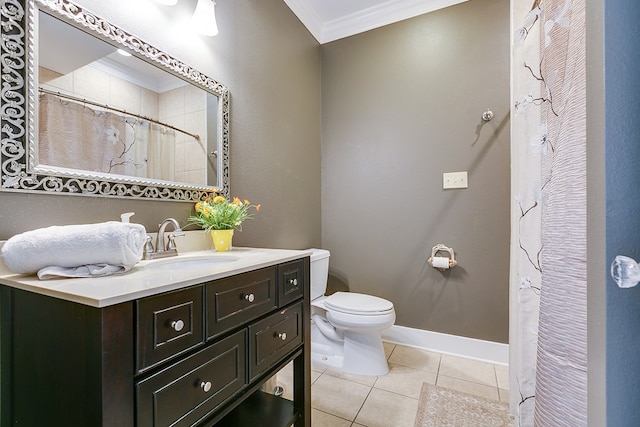 bathroom featuring crown molding, vanity, tile patterned floors, and toilet