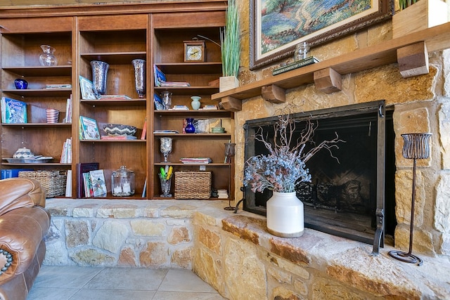 details with a stone fireplace