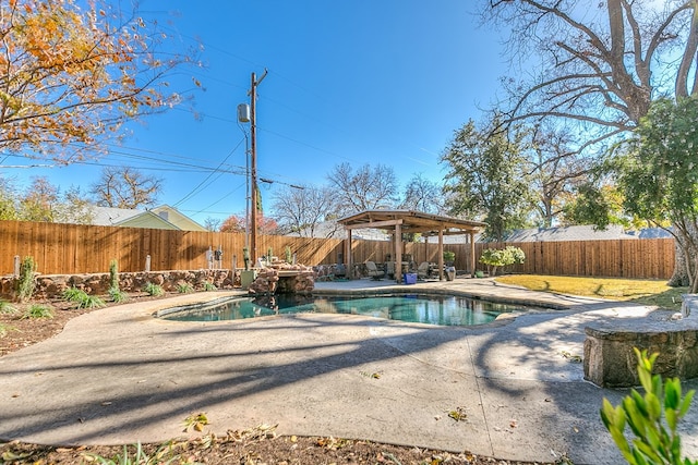 view of swimming pool featuring a gazebo and a patio area