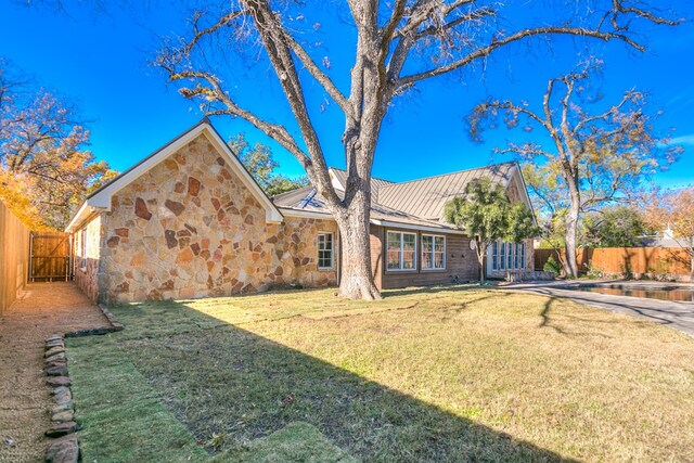 exterior space with a yard