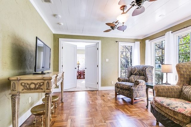 sitting room with parquet floors, wooden ceiling, and ceiling fan