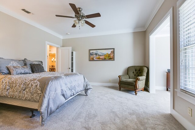 bedroom with crown molding, carpet flooring, and ceiling fan