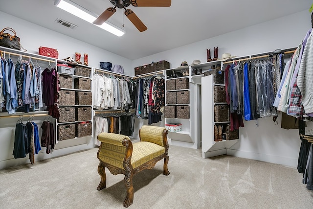 spacious closet featuring carpet floors and ceiling fan