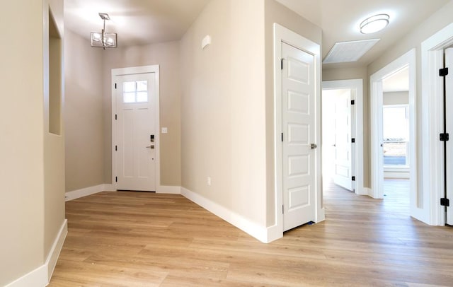 entryway with light hardwood / wood-style flooring