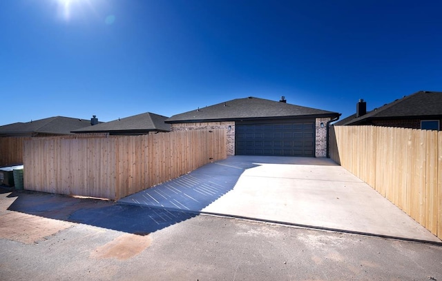 exterior space featuring a garage