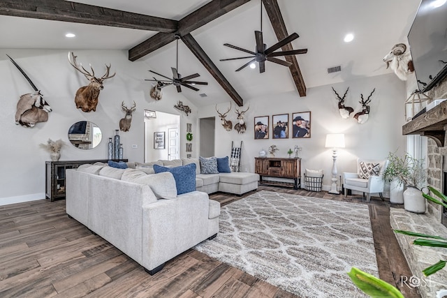 5949 Merrick St, San Angelo, TX 76904 - living room with a stone fireplace, wood finished floors, a ceiling fan, and recessed lighting