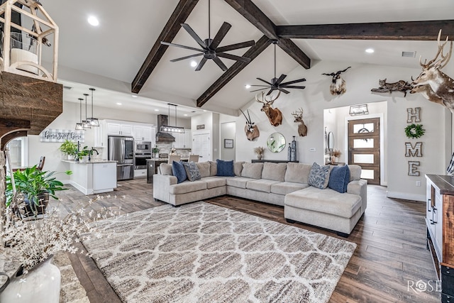 5949 Merrick St, San Angelo, TX 76904 - living room featuring a ceiling fan, beamed ceiling, wood finished floors, high vaulted ceiling, and recessed lighting