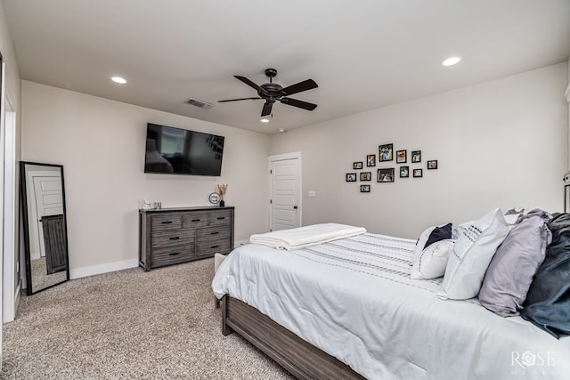 5949 Merrick St, San Angelo, TX 76904 - bedroom with light colored carpet, recessed lighting, and ceiling fan