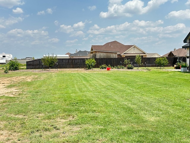 view of yard featuring a fenced backyard