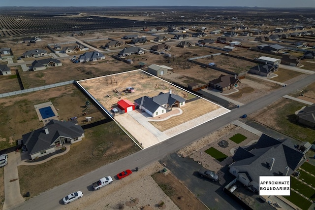 drone / aerial view with a residential view