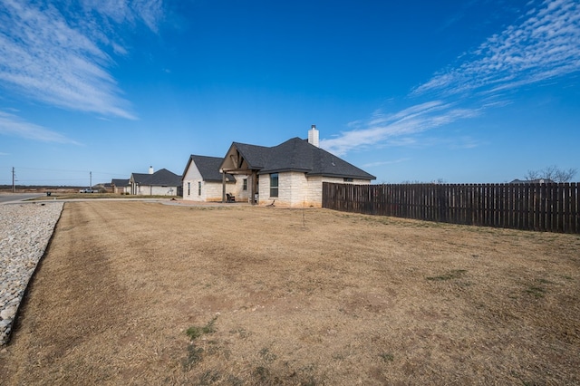 exterior space with fence