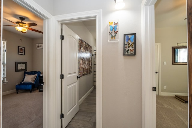3536 Jaguar Trl, San Angelo, TX 76901 - hallway featuring carpet and baseboards