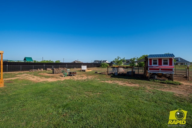 3536 Jaguar Trl, San Angelo, TX 76901 - view of yard featuring exterior structure and an outdoor structure